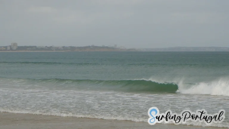 Small waves breaking on the shore of Lagos beach