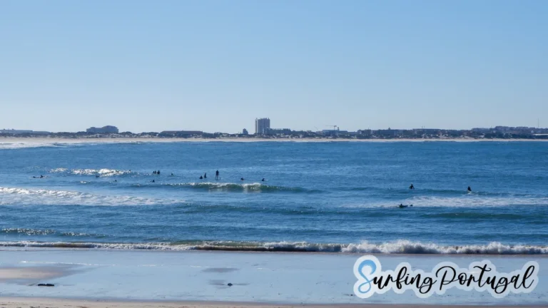 Surfers in the water at Baleal Cantinho