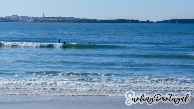 Surfers in the water at Baleal Cantinho