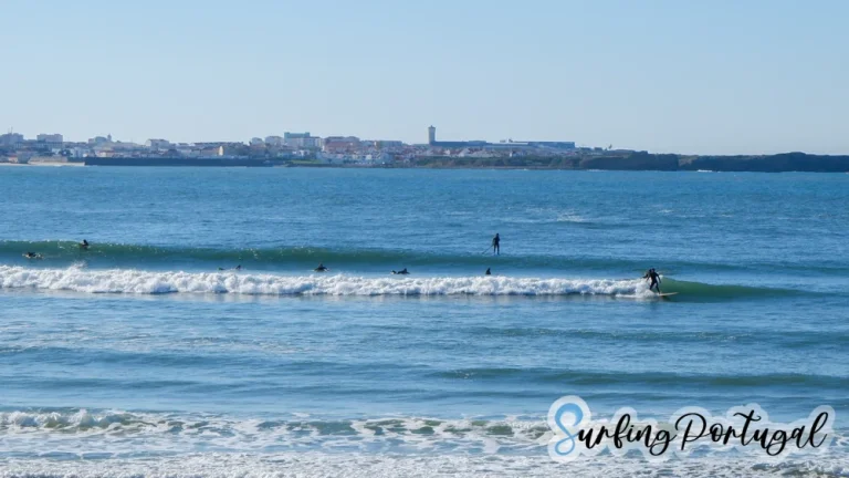 Surfers in the water at Baleal Cantinho
