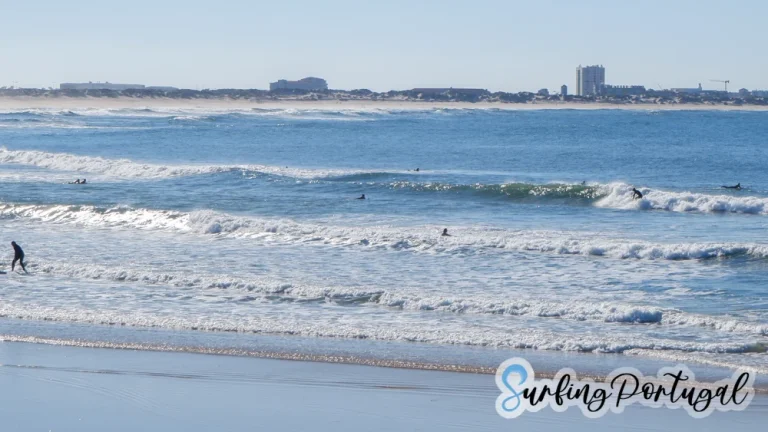 Surfers in the water at Baleal Cantinho