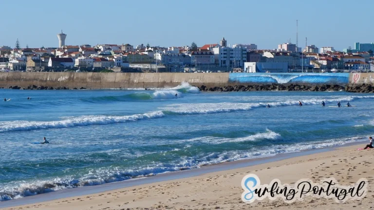 Surf spot of Molhe Leste, with a wave painted on the wall in the background