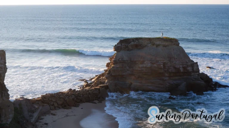 Rock with a virgin on top, at Porto Novo surf spot