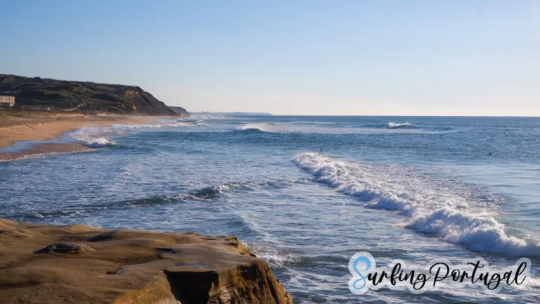 Surfers in the water at Areia Branca surf spot