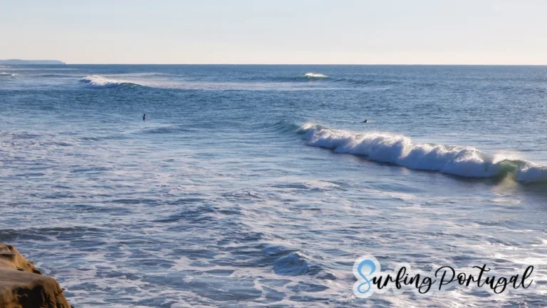 Surfers in the water at Areia Branca surf spot