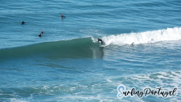 Surfer catching a right wave on Foz de Lizandro