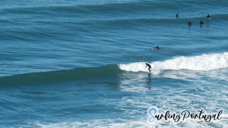 Surfer catching a right wave on Foz de Lizandro