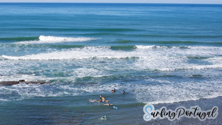 Beginner surfers taking surf lessons at Matadouro bay