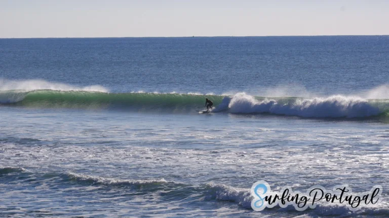 Surfer on a wave at Supertubos