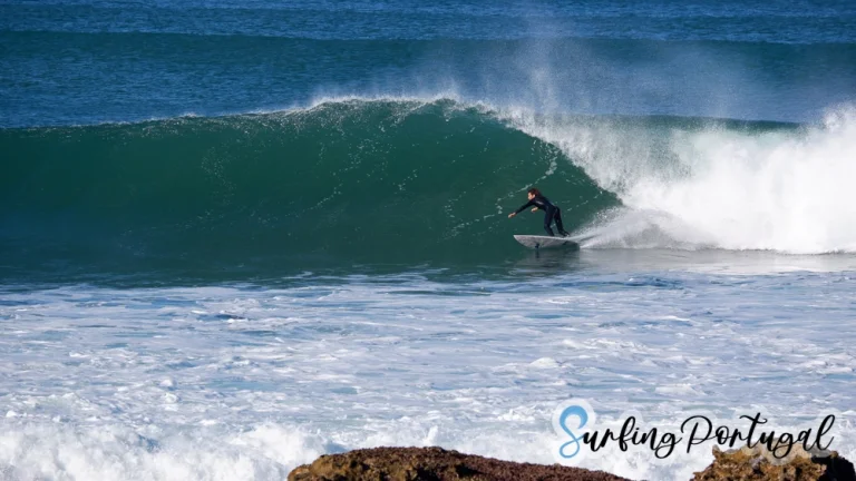Surfer at Coxos wave, Ericeira