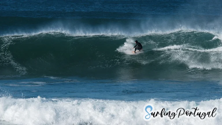 Surfer at Coxos wave, Ericeira