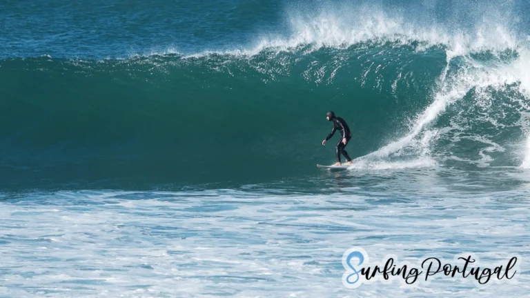 Surfer at Coxos wave, Ericeira